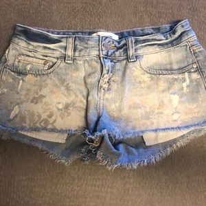 PINK jean shorts with silver floral print